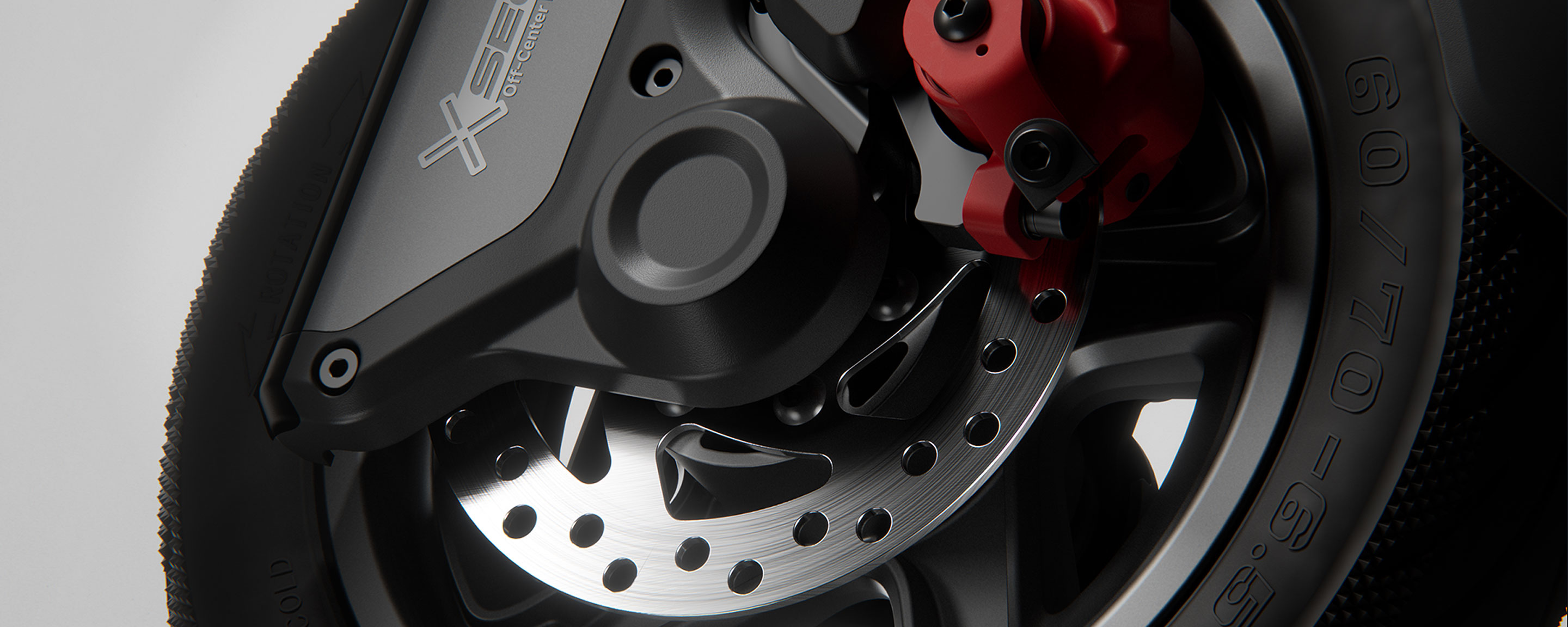 Close-up of the Segway F3 front disc brake, caliper and wheel